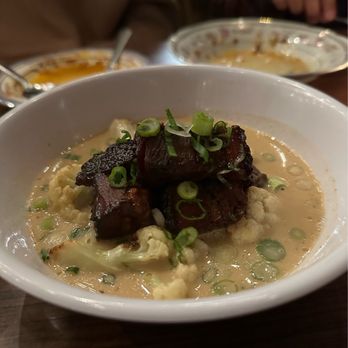 Eem - White Curry with Brisket Burnt Ends - Cocktail Bars Near Me - Portland, Oregon Eem - White Curry with Brisket Burnt Ends - Cocktail Bars Near Me - Portland, Oregon