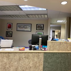 Providence Medical Group Pediatric Surgery - Reception Desk.  Small waiting area.