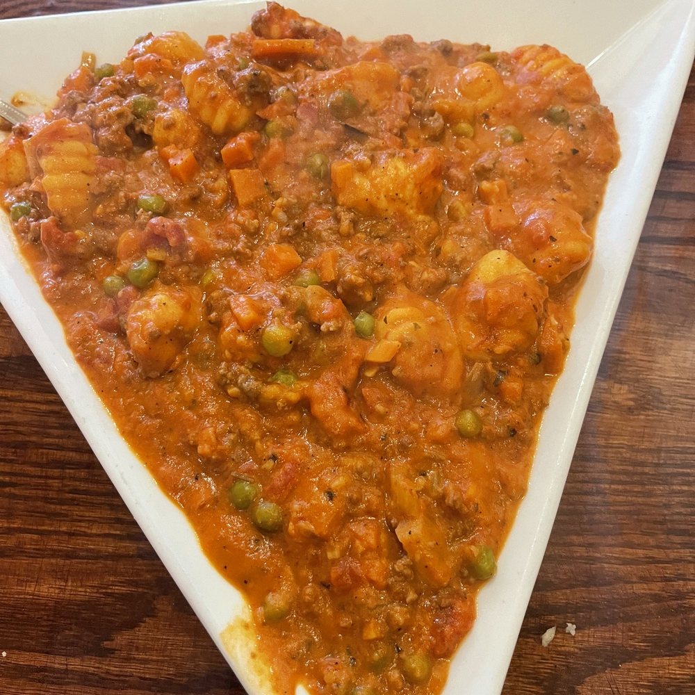 O Sole Mio Cucina Italiana - Gnocchi with ragu bolognese sauce - Italian Near Me - Newberry, Florida O Sole Mio Cucina Italiana - Gnocchi with ragu bolognese sauce - Italian Near Me - Newberry, Florida