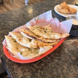 Chettinad Aachy's - Garlic naan and veg samosa (one serving is 6 pc)