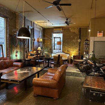 Five Flies Coffee - a living room filled with furniture - Coffee & Tea Near Me - New York, New York
