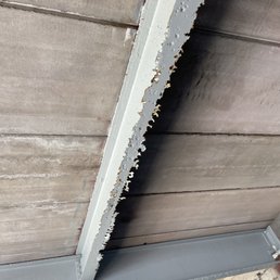 Rotting parking structure support beams Rotting parking structure support beams