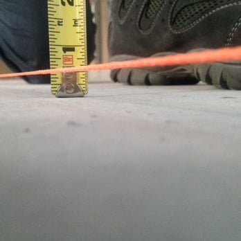 Verafloor Systems - This was the floor after the third attempt to get it flat.  Still not within standard. - Flooring Near Me - Skokie, Illinois