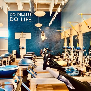 Club Pilates - In studio strap work during class. - Pilates Near Me - Bend, Oregon Club Pilates - In studio strap work during class. - Pilates Near Me - Bend, Oregon