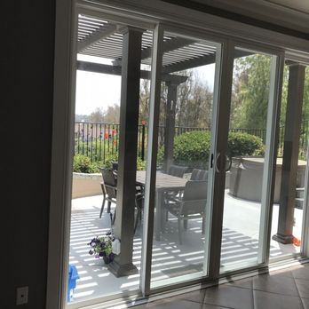 The Window Shoppe - Our new 4 panel sliding glass doors. - Windows Installation Near Me - Vista, California The Window Shoppe - Our new 4 panel sliding glass doors. - Windows Installation Near Me - Vista, California
