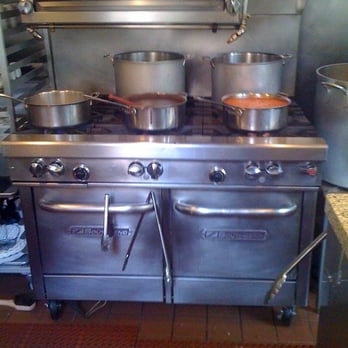 Xoco - Sauces simmering - Mexican Near Me - Chicago, Illinois
