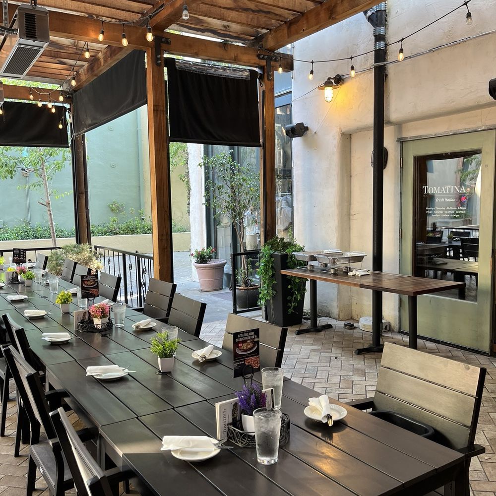 Tomatina - Private patio dining was nicely set up for our party. - Italian Near Me - Alameda, California Tomatina - Private patio dining was nicely set up for our party. - Italian Near Me - Alameda, California