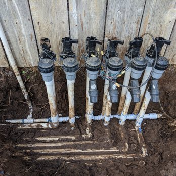 Green Thumb Landscape - a group of pipes and pipes in the ground - Landscaping Near Me - San Diego, California Green Thumb Landscape - a group of pipes and pipes in the ground - Landscaping Near Me - San Diego, California