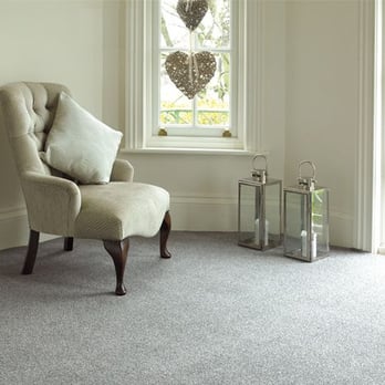 Carpet To Go - a chair in front of a window - Carpeting Near Me Carpet To Go - a chair in front of a window - Carpeting Near Me