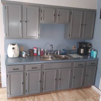 L S Construction - a kitchen with gray cabinets - Flooring Near Me L S Construction - a kitchen with gray cabinets - Flooring Near Me