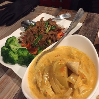 Cha Thai - Yellow curry in the front and garlic pepper beef in the back - Thai Near Me - Rancho Cordova, California Cha Thai - Yellow curry in the front and garlic pepper beef in the back - Thai Near Me - Rancho Cordova, California