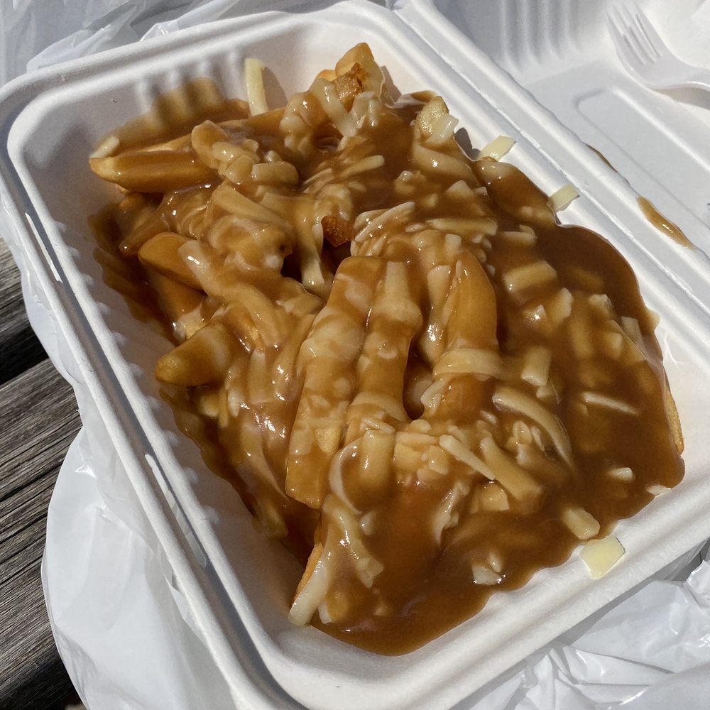 a container of macaroni and cheese a container of macaroni and cheese