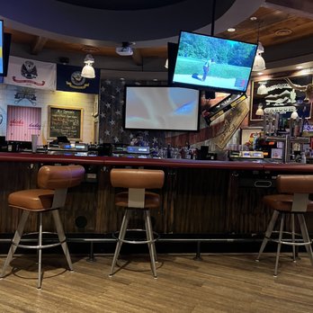 Al's Garage - a bar with two televisions on the wall - Sports Bars Near Me - Las Vegas, Nevada Al's Garage - a bar with two televisions on the wall - Sports Bars Near Me - Las Vegas, Nevada