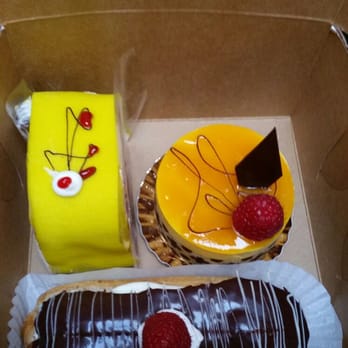 Schubert's Bakery - Swedish Princess cake slice, Mango Mousse Cake, and an eclair. - Bakeries Near Me - San Francisco, California Schubert's Bakery - Swedish Princess cake slice, Mango Mousse Cake, and an eclair. - Bakeries Near Me - San Francisco, California