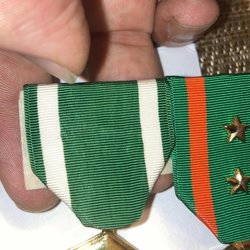 Jenny's Tailoring - Don't get medals done through them. They lost my medals and replaced them with used ones that were in a lot worse condition.