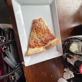The Corner Pizza Bar - Cheese slice - Italian Near Me - Orlando, Florida The Corner Pizza Bar - Cheese slice - Italian Near Me - Orlando, Florida