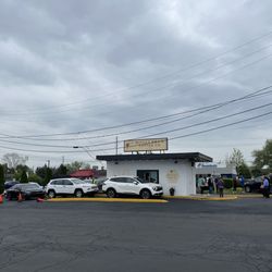 Drive up window! Parking on the right in photo or shopping center behind them.
