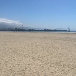 Beach view looking toward the pier where the harbor restaurant is Beach view looking toward the pier where the harbor restaurant is