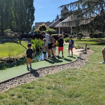 Tualatin Island Greens - Fishing something out of the drink on 18 - Mini Golf Near Me - Tualatin, Oregon Tualatin Island Greens - Fishing something out of the drink on 18 - Mini Golf Near Me - Tualatin, Oregon