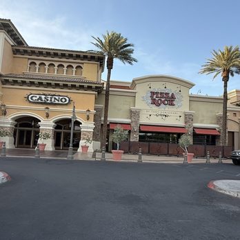 Pizza Rock - They're located next to the entrance to the casino. There is a parking lot out front and they have outdoor seating. - Pizza Near Me - Henderson, Nevada