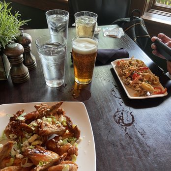 Cedric's Tavern - Chicken Jack and Coke Wings, Spicy Buffalo Calamari, pale ale and Ginger Ale. - Pubs Near Me - Asheville, North Carolina