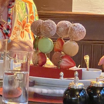 Red Horse Steakhouse by David Burke - Sugared donuts and macaroons. I only wish I could have tasted these. Next time for sure. This was from the table next to ours. - Steakhouses Near Me - Rumson, New Jersey