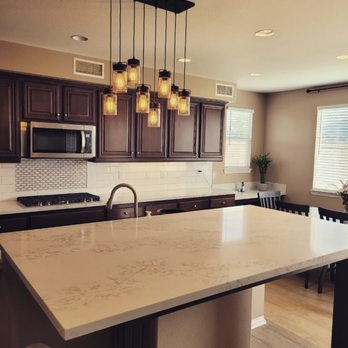 Flooring Mart - Calacatta Alaska quartz countertops and subway tile backsplash - Flooring Near Me - Upland, California
