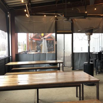Yellowhammer Brewing - Outdoor seating - heaters, stage for live music - Breweries Near Me - Huntsville, Alabama Yellowhammer Brewing - Outdoor seating - heaters, stage for live music - Breweries Near Me - Huntsville, Alabama