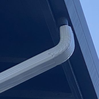 Gogo Gadget Painting - Downspout not connected to gutter.  He assured me this is ok and will not move.  He ended up fixing it but not without a fight. - Painters Near Me