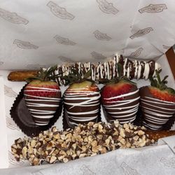 Rocky Mountain Chocolate Factory - 4 Dipped strawberries and 2 dipped pretzels