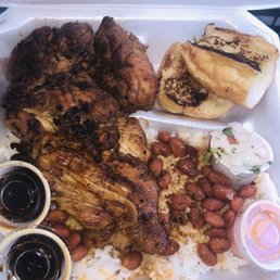 Chicken plate, rice and beans and garlic bread. Chicken plate, rice and beans and garlic bread.
