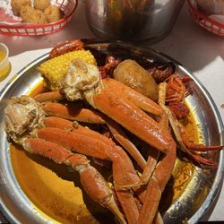 1/2 lb crawfish and 1/2 lb snow crab with all of the seasonings/sauces in medium