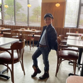 The Local - My 7 year old rocking his Texas boots - New American Near Me - Austin, Texas