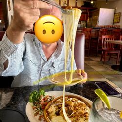 Monarca Bar & Grill - Super Cheesy Chicken fajita Queso Flameado