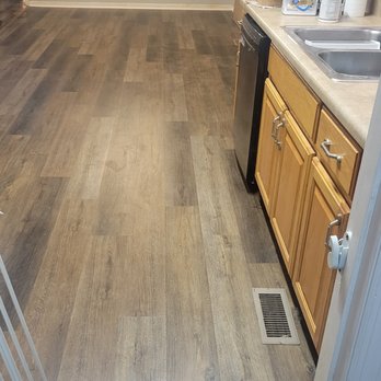 Triad Restoration - a kitchen with wood flooring - General Contractors Near Me Triad Restoration - a kitchen with wood flooring - General Contractors Near Me