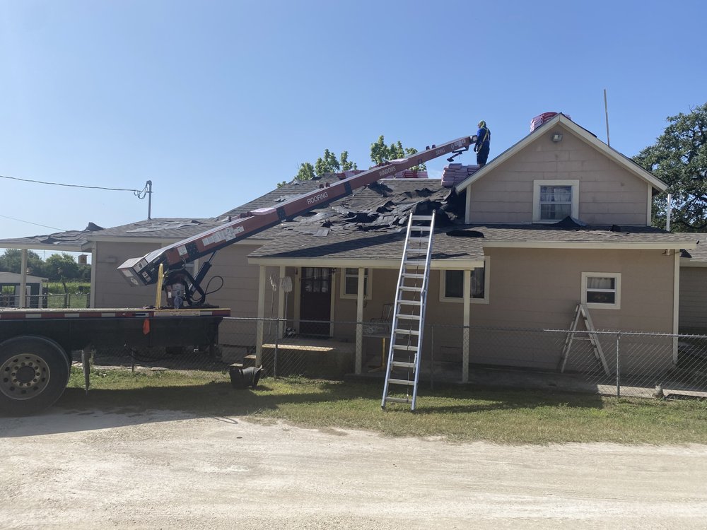 Slide of Strain Roofing