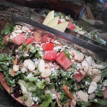 Satchel's Pizza - Their famous salad! Sooo good - Pizza Near Me - Gainesville, Florida