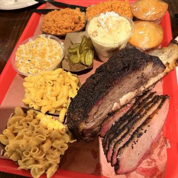 Terry Black's Barbecue - Beef rib, brisket, mac & cheese, Mexican corn, and rice, cornbread, pickles, and banana pudding. - Barbeque Near Me - Austin, Texas
