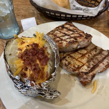 Logan's Roadhouse - Pork chops with loaded baked potato - Steakhouses Near Me - Martinsburg, West Virginia Logan's Roadhouse - Pork chops with loaded baked potato - Steakhouses Near Me - Martinsburg, West Virginia