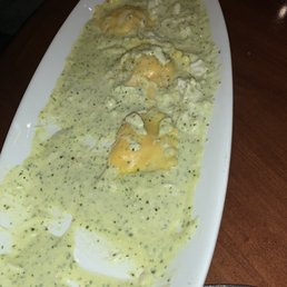 Lobster/ crab ravioli in pesto sauce. Insanely good. Lobster/ crab ravioli in pesto sauce. Insanely good.