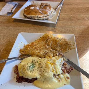 Crestline Cafe - Mountain Benedict with side of hash browns and full stack chocolate chip pancakes. - American Near Me - Crestline, California Crestline Cafe - Mountain Benedict with side of hash browns and full stack chocolate chip pancakes. - American Near Me - Crestline, California