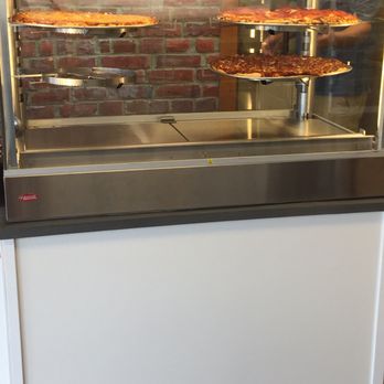 Lozza Mozza Pizza - This is the heat warmer that they have the pizza by the slice ( meat lovers, four cheese and pepperoni in the Display case.) - Pizza Near Me - Vernon, British Columbia