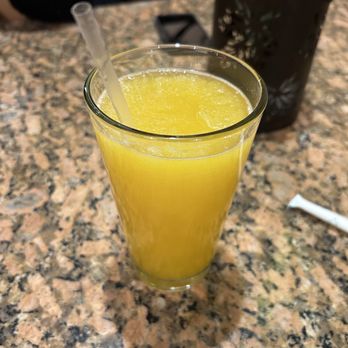 Caridad Restaurant - Passion fruit juice - Dominican Near Me - New York, New York