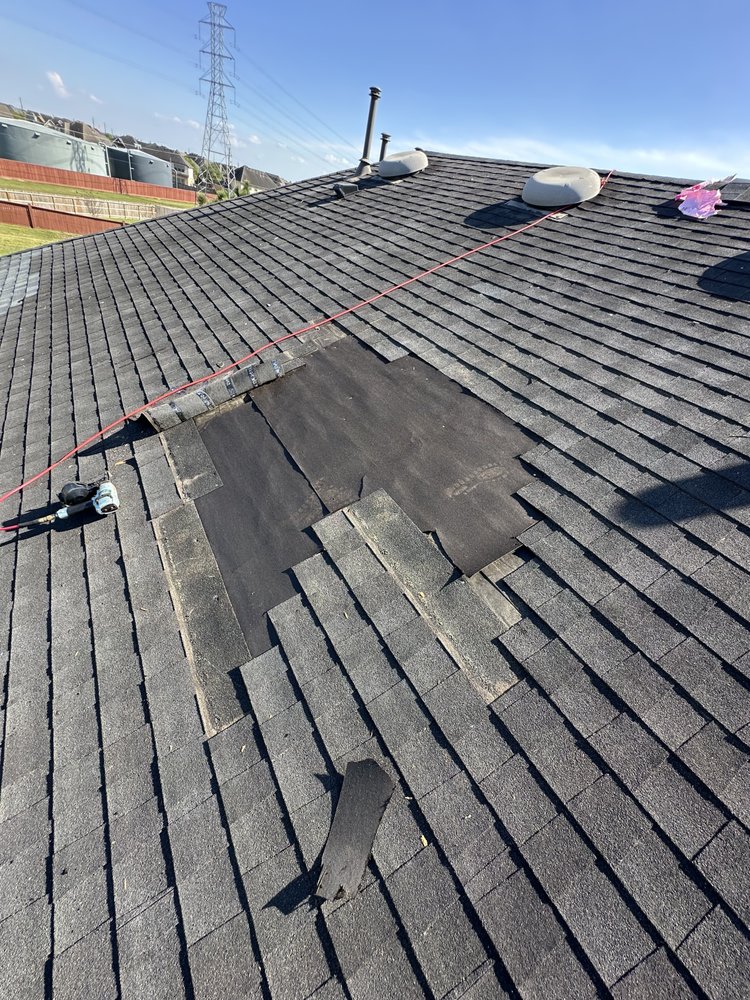 Slide of Redeemer Roofing