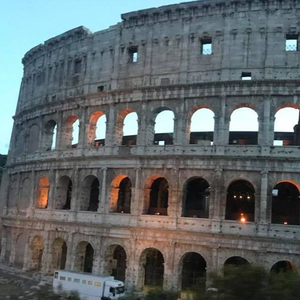 Colosseo - The Colosseum in the evening - Local Flavor Near Me - Rome, RM Colosseo - The Colosseum in the evening - Local Flavor Near Me - Rome, RM
