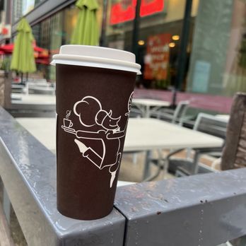Stan's Donuts - a cup of coffee on a bench - Coffee & Tea Near Me - Chicago, Illinois Stan's Donuts - a cup of coffee on a bench - Coffee & Tea Near Me - Chicago, Illinois