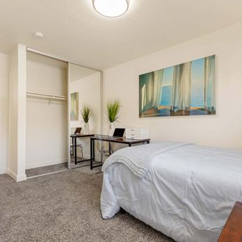 Aggie Square Apartments - Bedroom with large closet. - Apartments Near Me - Davis, California Aggie Square Apartments - Bedroom with large closet. - Apartments Near Me - Davis, California