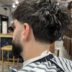 Textured fringe with low taper and blowout in the back