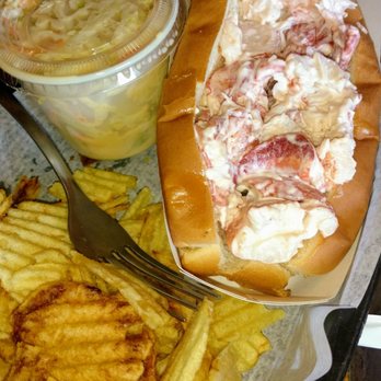 The Lobster Shack - Lobster roll served with chips and coleslaw. - Seafood Near Me - Ogunquit, Maine The Lobster Shack - Lobster roll served with chips and coleslaw. - Seafood Near Me - Ogunquit, Maine