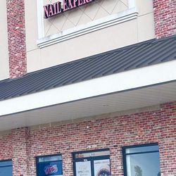 Nail Expert & Spa - The outside which is near Bargain Hunt